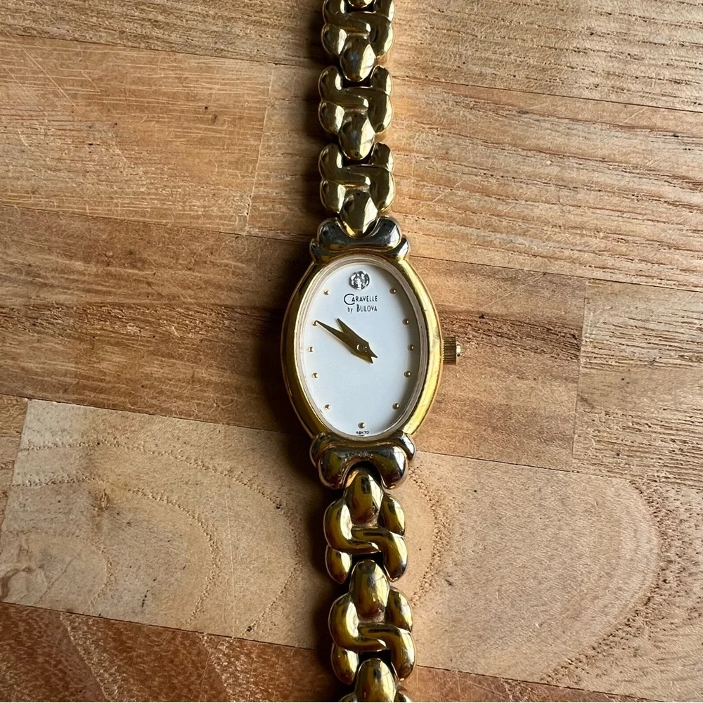 Caravelle by Bulova ladies oval gold tone dress watch NEW BATTERY